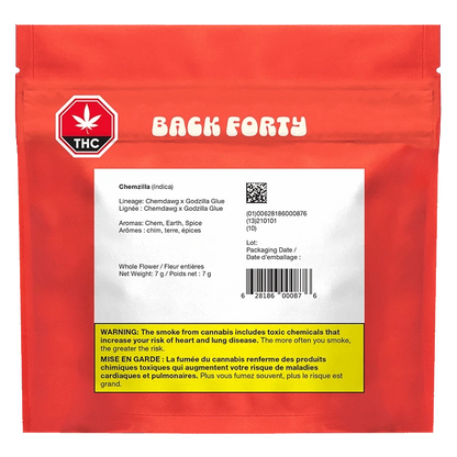 Center-forward view of a red Back Forty pouch with a white product label showing "Chemzilla" strain details and a yellow THC warning.