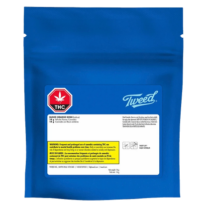 Front-facing shot of a blue resealable pouch labeled "Tweed Blood Orange Kush" with a white product label, red THC emblem, and small warning text.