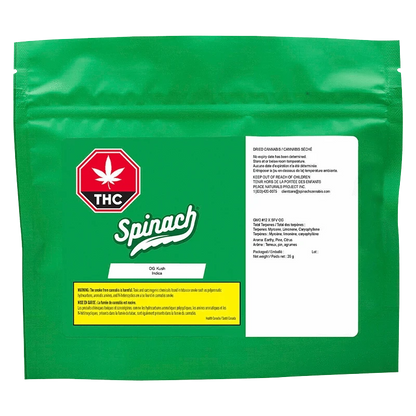 Flat front view of the green Spinach OG Kush pouch with a white info panel, red THC symbol, and yellow warning box.