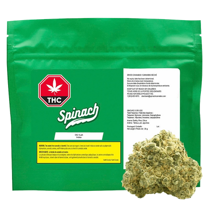 Front-facing shot of a green Spinach OG Kush pouch with THC symbol and a cannabis bud at the lower right.