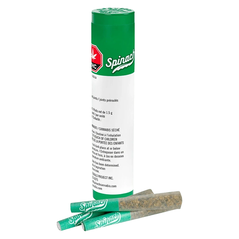 Tall front view of a green-and-white tube with two green Spinach pre-rolls laid in front, labeled "OG Kush PR 3 x 0.5 g."