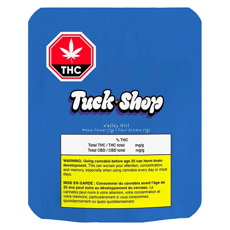 Front-facing blue package showing the Truck Shop "Valley Girl" label, THC red octagon logo at top left, and a yellow warning box at the bottom.