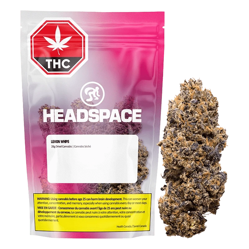 Front view of the Headspace Lemon Whips 28 g pouch with a pink gradient background beside a single dense, purple-tinged cannabis bud.
