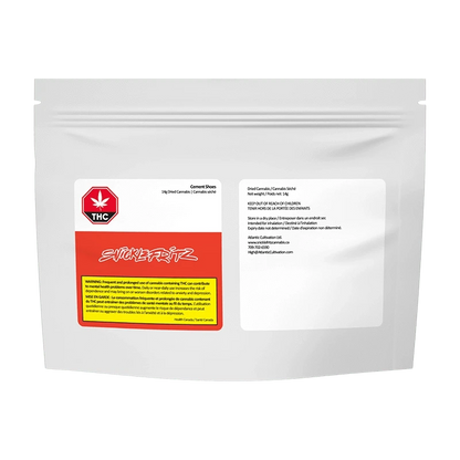 Front-facing shot of the SnickleFritz Cement Shoes white resealable pouch with red THC label and product information panels.