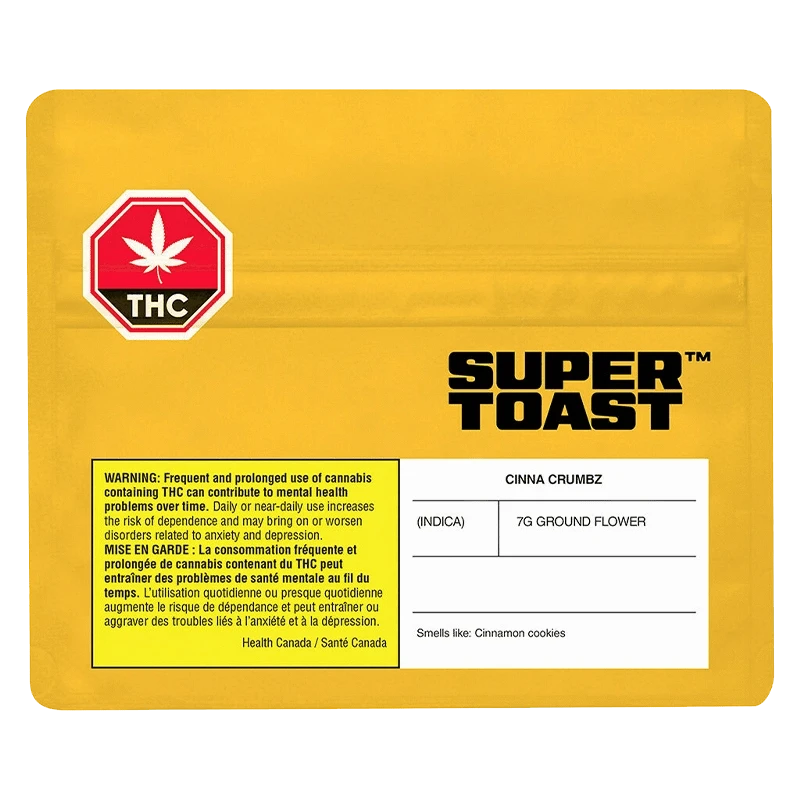 Front-facing image of a yellow pouch labeled "Cinna Crumbz" by Super Toast with a THC octagon and warning panel.