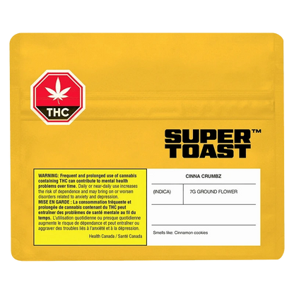 Front-facing image of a yellow pouch labeled "Cinna Crumbz" by Super Toast with a THC octagon and warning panel.