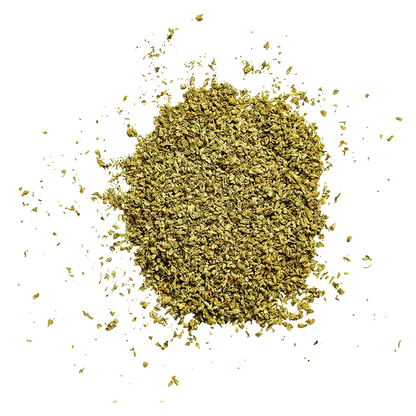 Top-down view of a loose, golden-brown pile of Cinna Crumbz with scattered crumbs on a pale background