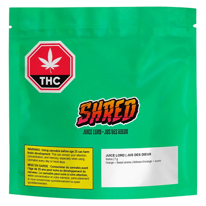 Front-facing shot of a bright green bag labeled Juice Lord Milled Flower with a bold "SHRED" logo, THC symbol, and warning panel.