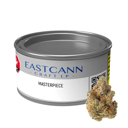 Front-angle view of an Eastcann - Masterpiece metal can with label visible and a single cannabis bud placed at its base.