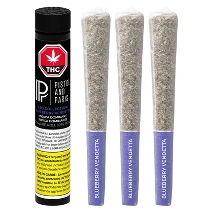 Three pre-rolled joints standing upright next to a black tube, shown front-on with the label "LSO Collection Blueberry Vendetta PR 3 x 0.5 g" visible on the tube.