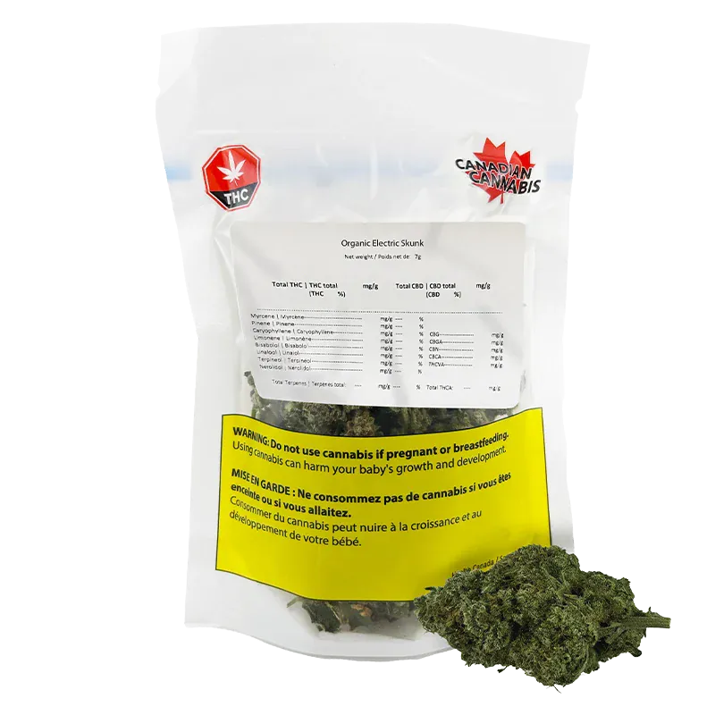 Clear front view of a sealed pouch labeled "Organic Electric Skunk" with a yellow health warning and green buds visible inside and beside it.