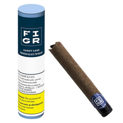 Angled view of a Kandy Cake Glass Tip Blunt PR 1 x 1 g tube standing beside a brown blunt with a blue glass tip.