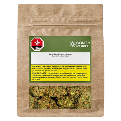 Front view of a brown resealable pouch showing the South Point Turbo Diesel label, warning strip and a clear window revealing green cannabis buds.
