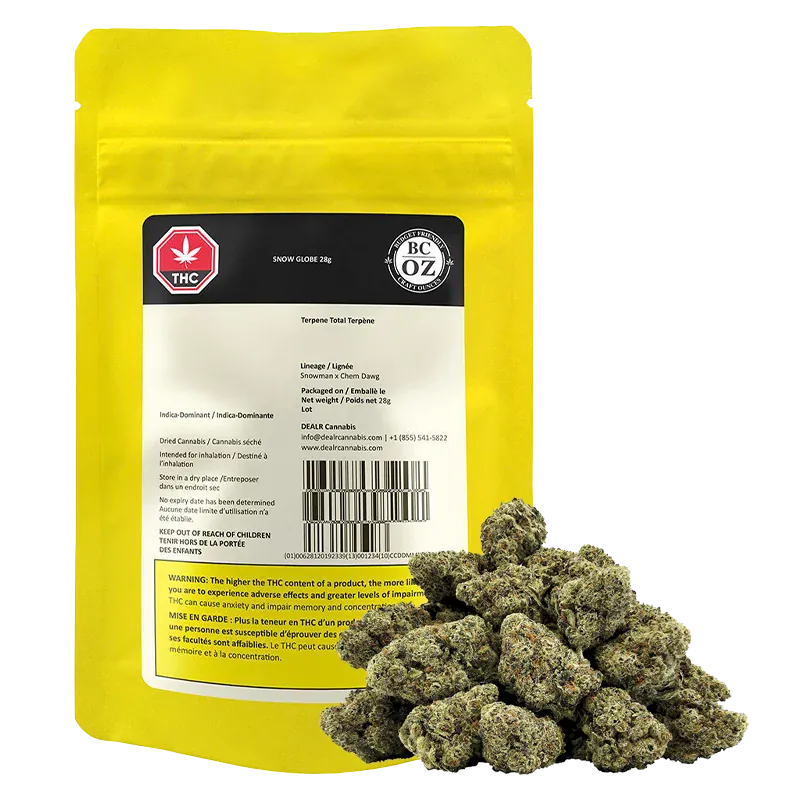 Front view of the Snow Globe 28 g yellow pouch labeled "Snow Globe" with a pile of green cannabis buds in front.