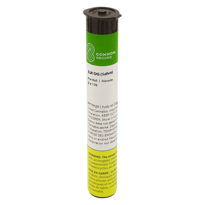 Tall front-facing view of the Common Ground Lit OG PR 2 x 1 g pre-roll tube with green, white, and yellow label and black cap.