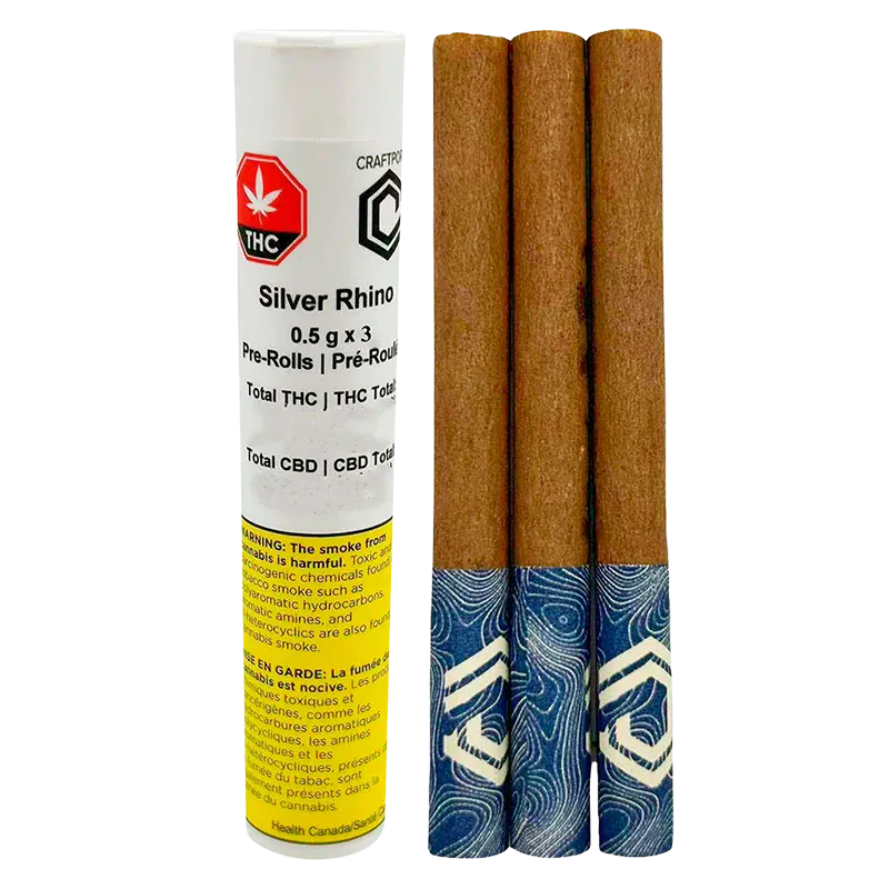 Three pre-rolls with blue patterned tips standing beside a white labeled tube reading Silver Rhino PR 3 x 0.5 g.