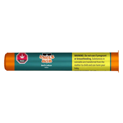 Horizontal close-up of the orange tube packaging labeled "Uncle Bob Devil's Lettuce PR 1 x 0.5 g" showing teal branding, a THC symbol, and a yellow warning panel.
