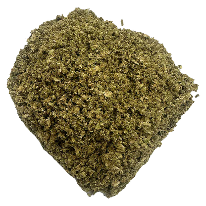 Top-down close-up of a loose mound of green flakes labeled Crab Cakes Premium against a white background.