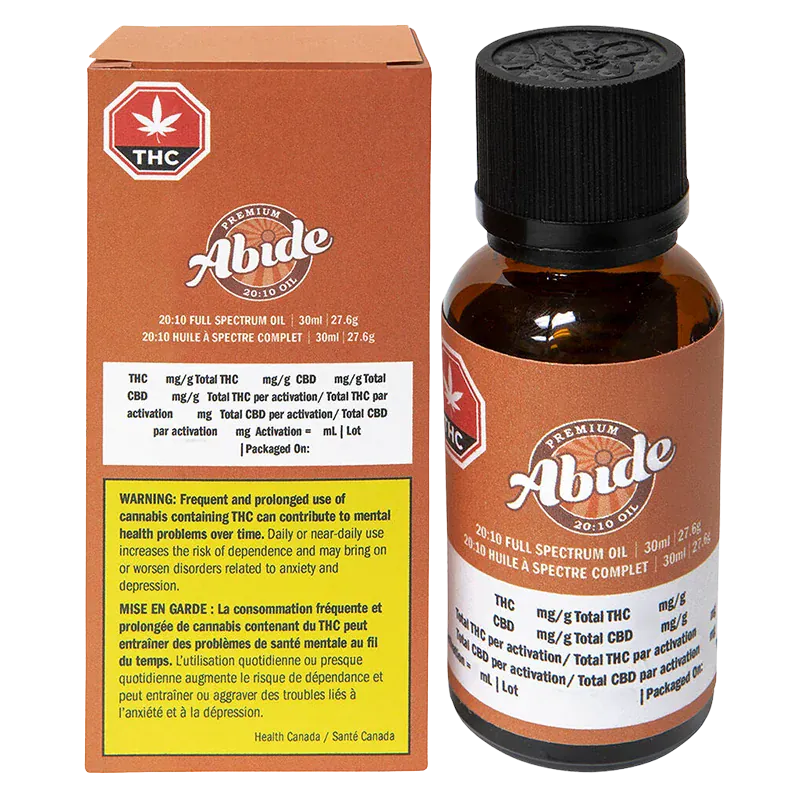 Front view of the 20:10 Full Spectrum Oil Abide 30 ml amber glass bottle with black cap shown next to its brown branded box.