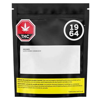 Front-facing shot of a black resealable pouch labeled "Kush Mints" with a red THC stop-sign icon and a white 1964 logo above a blank white label.