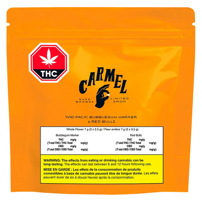 Front-facing orange pouch labeled "Bubblegum Marker & Red Bullz" with a centered Carmel logo, THC badge at top left, and a white nutrition panel and yellow warning box near the bottom.