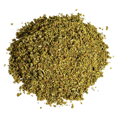 Top-down view of a loose pile of Cropped Blueberry showing fine greenish herb granules against a white background.
