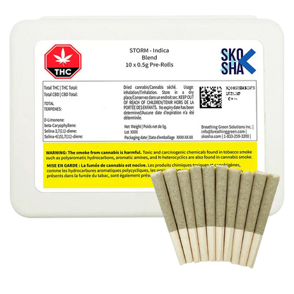Pack shot of a white plastic tray and fan of ten rolled joints labeled "Storm Indica PR 10 x 0.5 g" with a yellow warning panel.