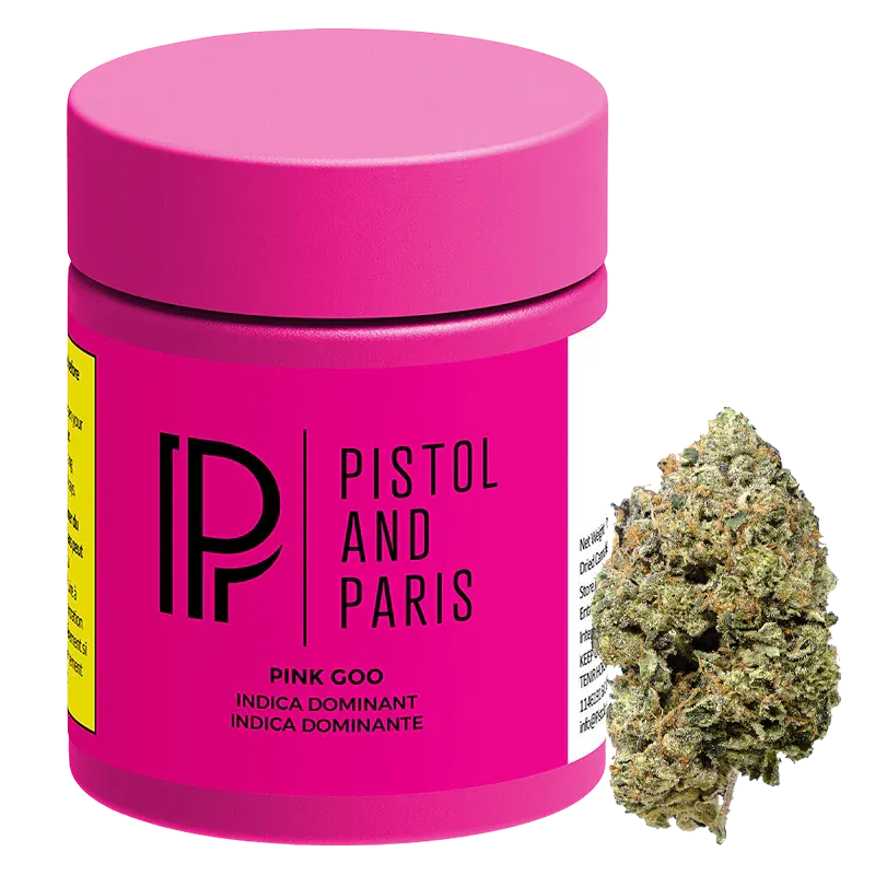 Three-quarter front view of the bright pink Pistol and Paris Pink Goo jar with a cannabis bud positioned to its right.