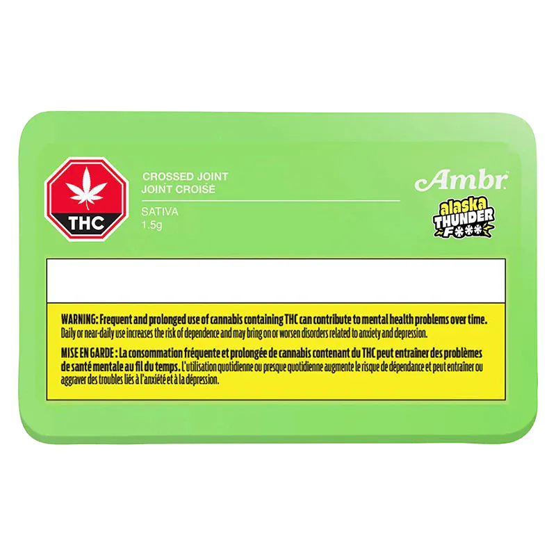 Top-down view of a bright green packet labeled "Alaskan Thunder Cross PR 1 x 1 g" with THC warning box and Ambr logo.