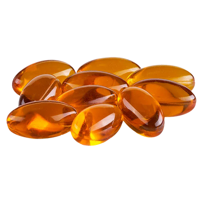 Close-up of glossy amber softgel capsules arranged in a small pile, Gems 5:5 Capsules.