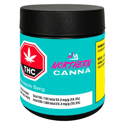 Angled front view of a turquoise Northern Canna Pineapple Bang jar with a black lid, THC emblem, and a yellow warning label on the side.