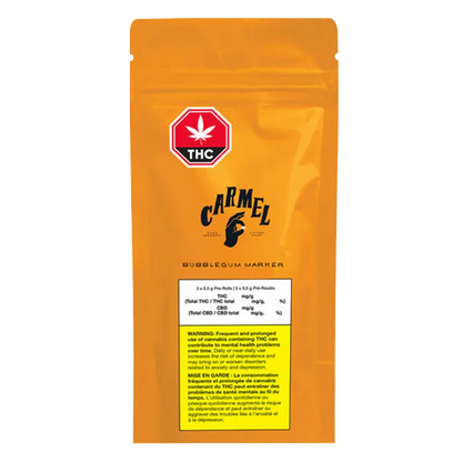 Front-facing shot of the orange pouch labeled Carmel Bubblegum Marker PR 3 x 0.5 g with a red THC symbol and a yellow warning panel.