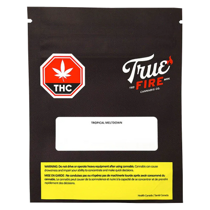 Front-facing image of the black True Fire Tropical Meltdown bag with a red THC stop-sign logo, white label area, and yellow warning box.