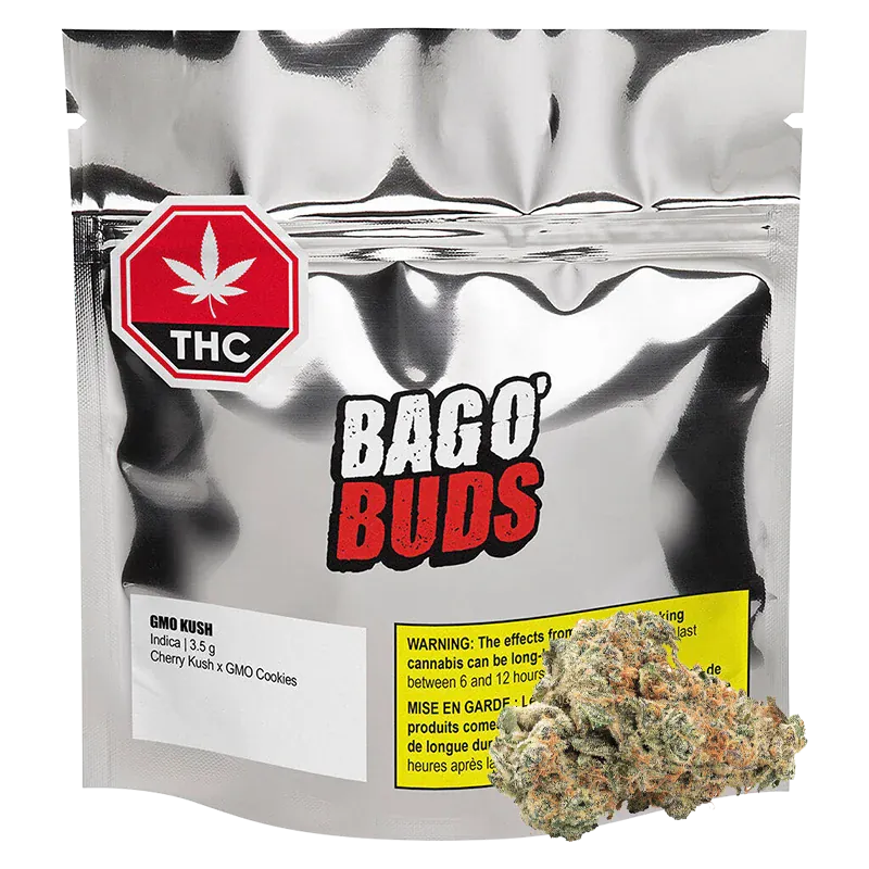 Front-facing shot of a metallic pouch labeled BAGO' BUDS with a THC symbol and a GMO Kush Indica 3.5 g label, a cannabis bud resting at the pouch base