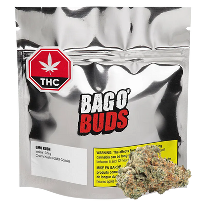 Front-facing shot of a metallic pouch labeled BAGO' BUDS with a THC symbol and a GMO Kush Indica 3.5 g label, a cannabis bud resting at the pouch base