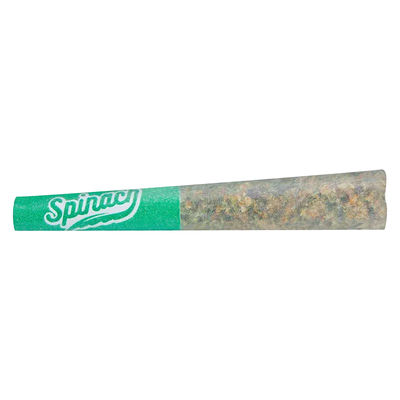Close-up of a rolled joint with a green Spinach tip, labeled OG Kush 1 x 0.5 g, shown horizontally on a white background.