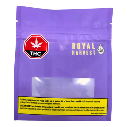 Front-facing shot of the purple Frosted Fruit Cake pouch with a clear window, yellow warning strip and THC symbol, titled Frosted Fruit Cake.