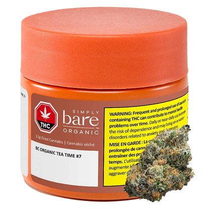 Front three-quarter view of the BC Organic Tea Time jar with orange lid and label, shown alongside a single cannabis bud.