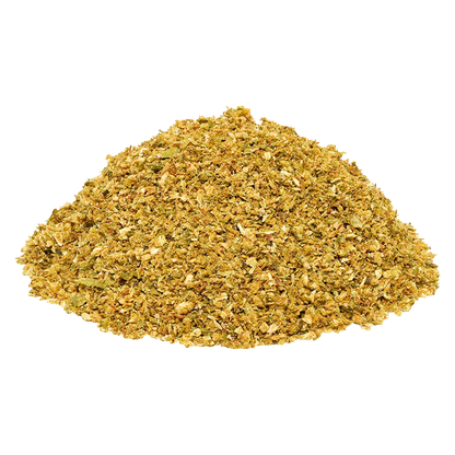 Close-up of a mound of golden-green Blueberry DNTs Grind on a white background, showing coarse, flaky texture and mixed leaf pieces.