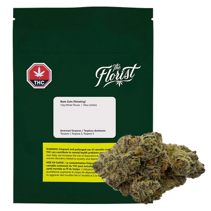 Front-facing shot of the dark green pouch and visible bud labeled Rare Cuts, with "The Florist" logo centered above the white product label.