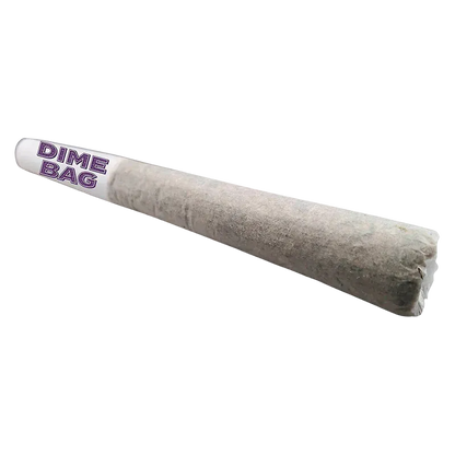 Angled close-up of a rolled joint with a white tip labeled "DIME BAG," showing the textured paper and cone shape of the Tropical BFJ PR 1 x 1.5 g.