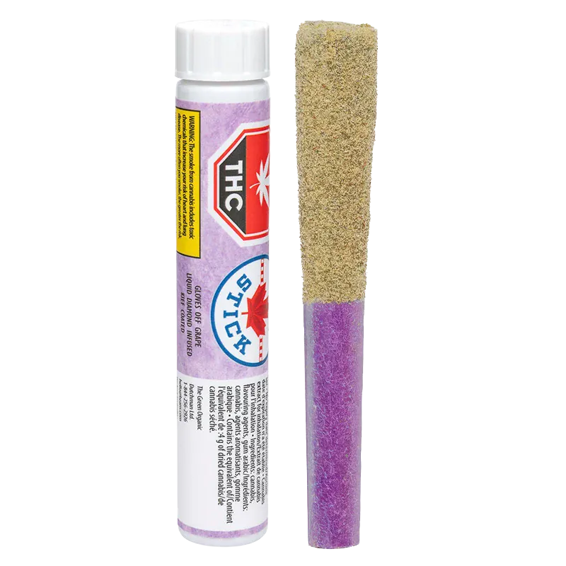 Straight-on studio shot of a BC Organic Mandarin Zktz pre-roll with a purple paper tip and kief-coated top standing beside its labeled white tube.