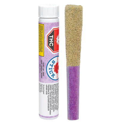 Straight-on studio shot of a BC Organic Mandarin Zktz pre-roll with a purple paper tip and kief-coated top standing beside its labeled white tube.