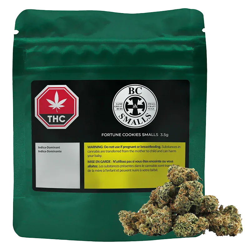 Front-facing green pouch labeled "Fortune Cookies Smalls" with a black product label, THC symbol, and cannabis buds piled at the lower right.