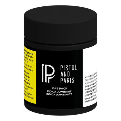 Angled front view of the black Pistol and Paris Gas Pack jar with bold white logo and a yellow warning label visible on the side.