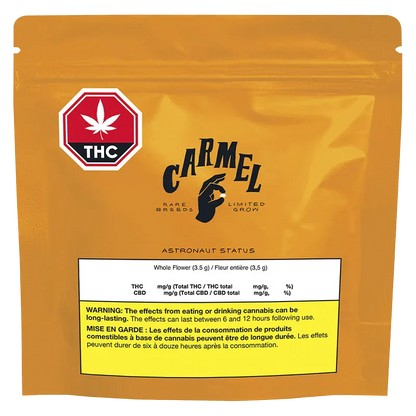 Front view of the gold pouch labeled "Carmel Astronaut Status" with a red THC symbol and a white nutrition box near the bottom.