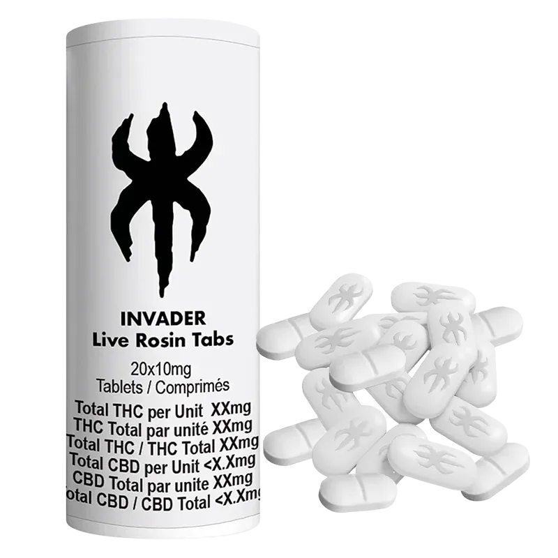 Front-facing white Invader Live Rosin Tabs bottle with black logo beside a scattered pile of oval white tablets.