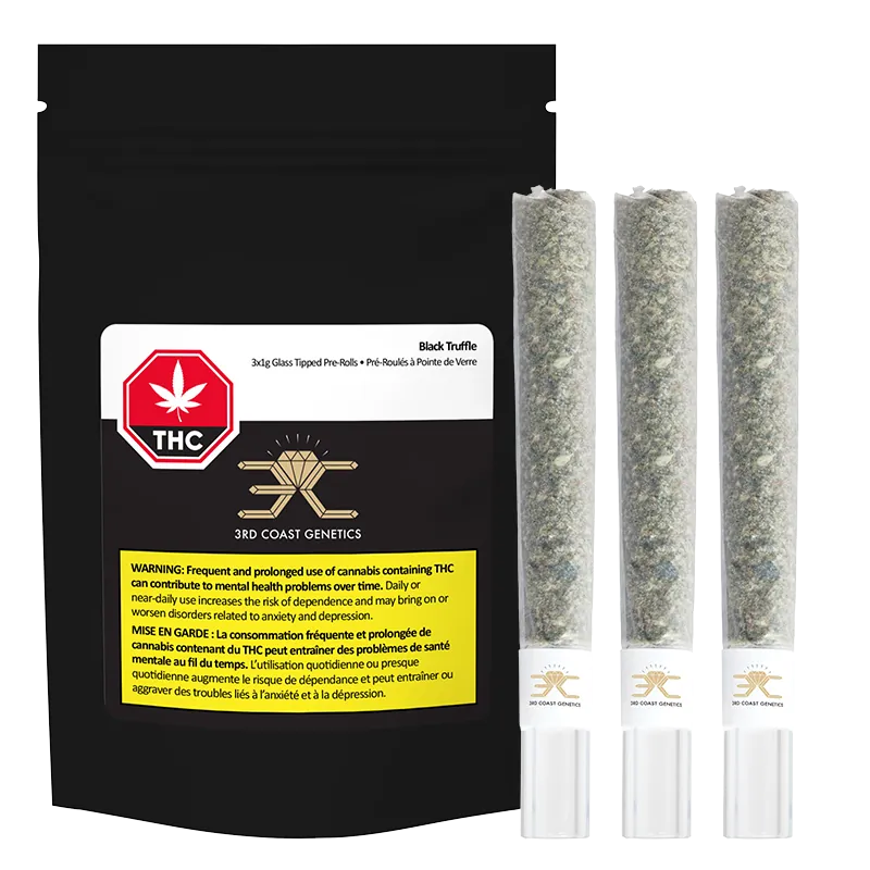 Front-facing shot of a black pouch alongside three glass-tipped joints, labeled "Black Truffle Glass Tip PR 3 x 1 g" and showing the 3rd Coast Genetics logo.