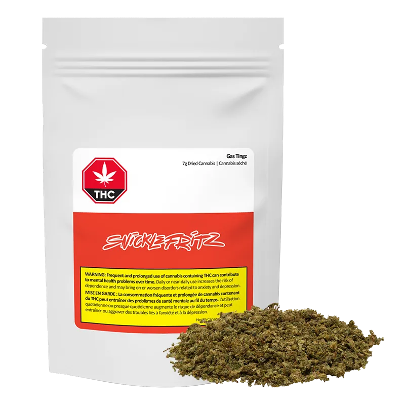 Front-facing shot of a white pouch labeled Gas Tingz with a red band and a pile of green-brown dried herb at its base.