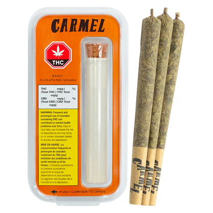 Front-facing shot of the Envy PR 3 x 0.5 g package with an orange-backed blister pack and three pre-rolled joints shown to its right.